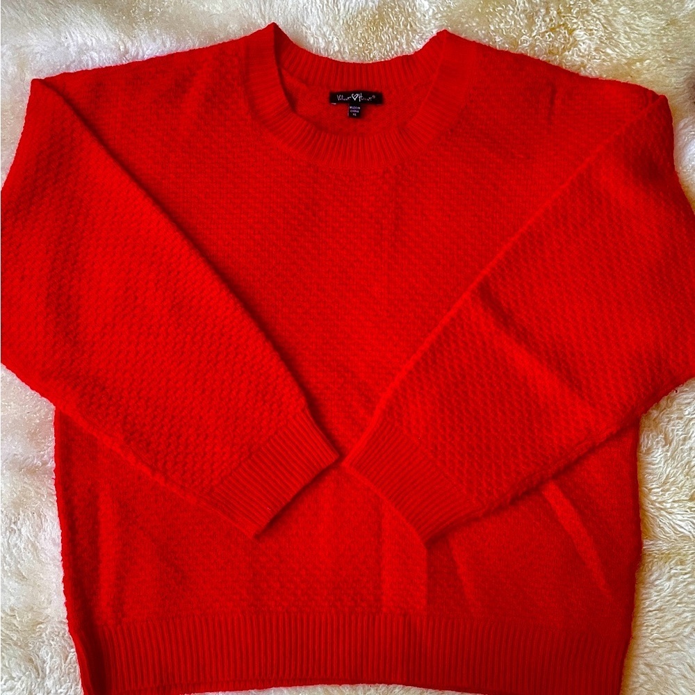 Size large vibrant red sweater.